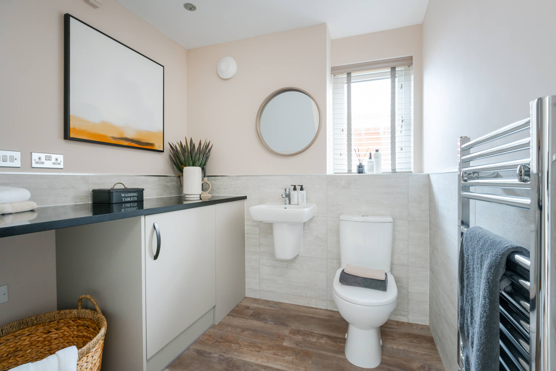 A downstairs toilet & utility room adds convenience