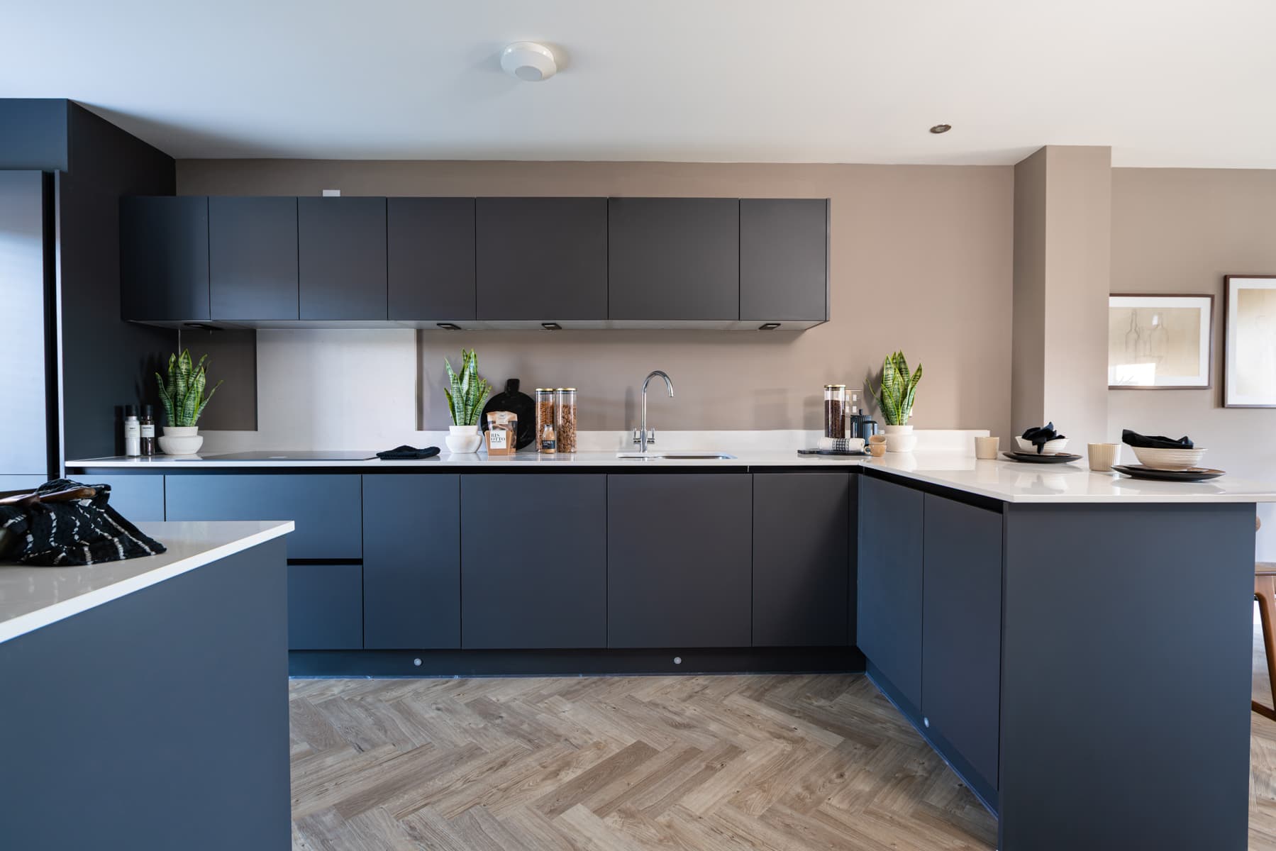 A modern kitchen with ample storage space