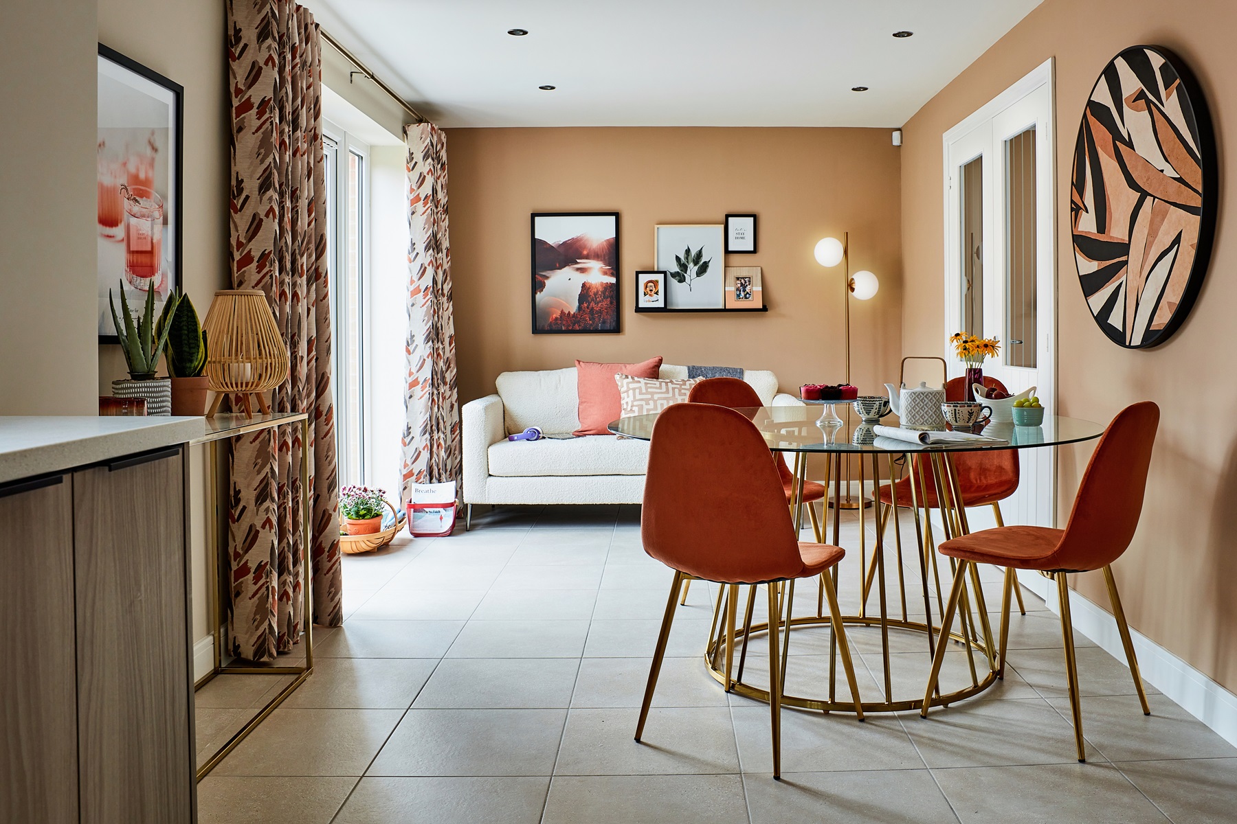 Make your kitchen diner a social area with a comfy sofa