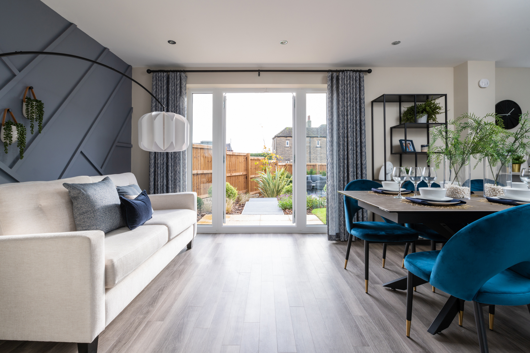 Double doors lead out from the dining area to the garden