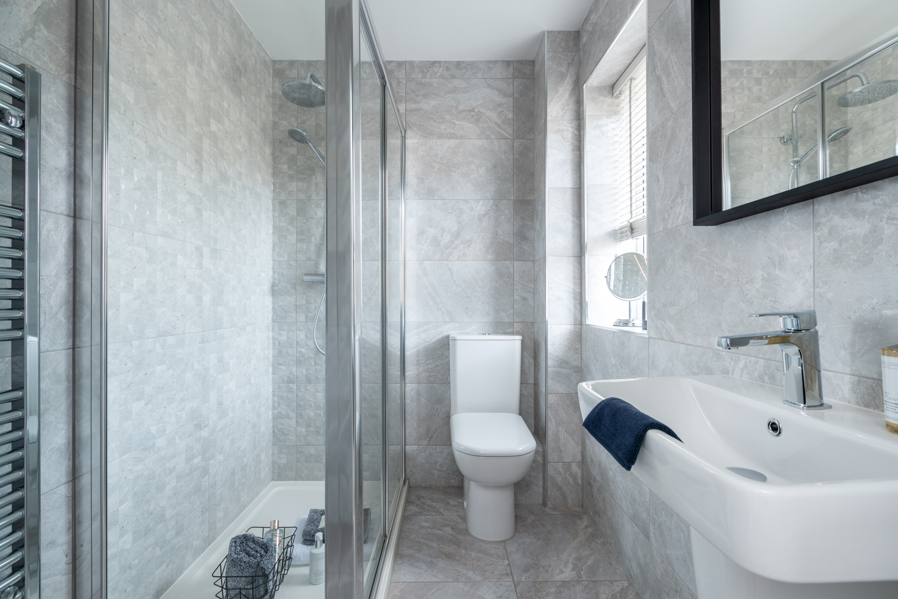 The en-suite features a double shower