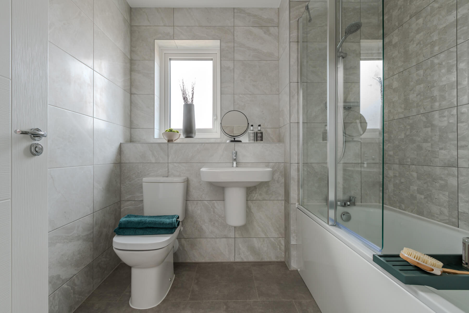 The main bathroom with high quality fixtures and fittings