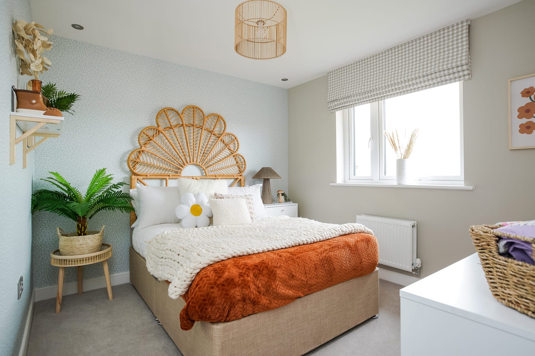 Double bed with rattan headboard