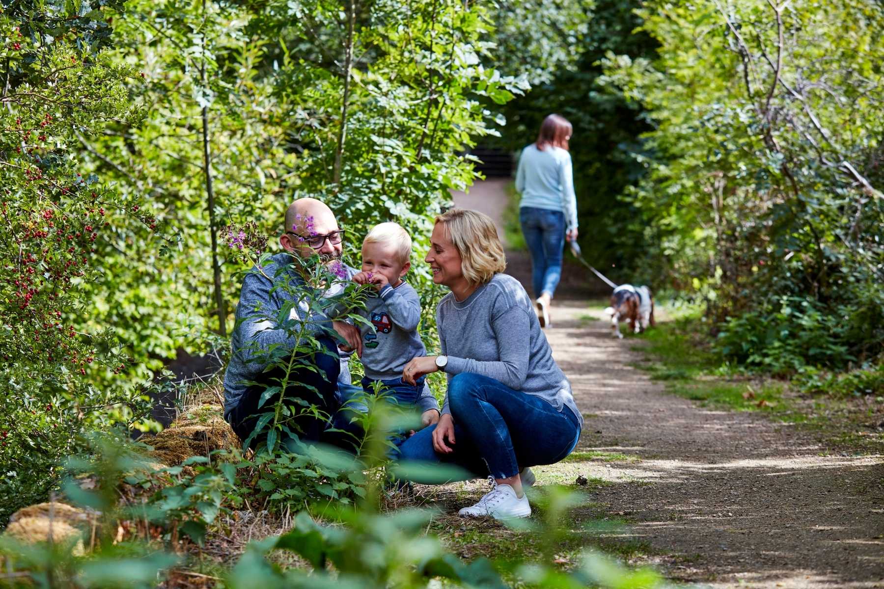 young family exploring local wildlife