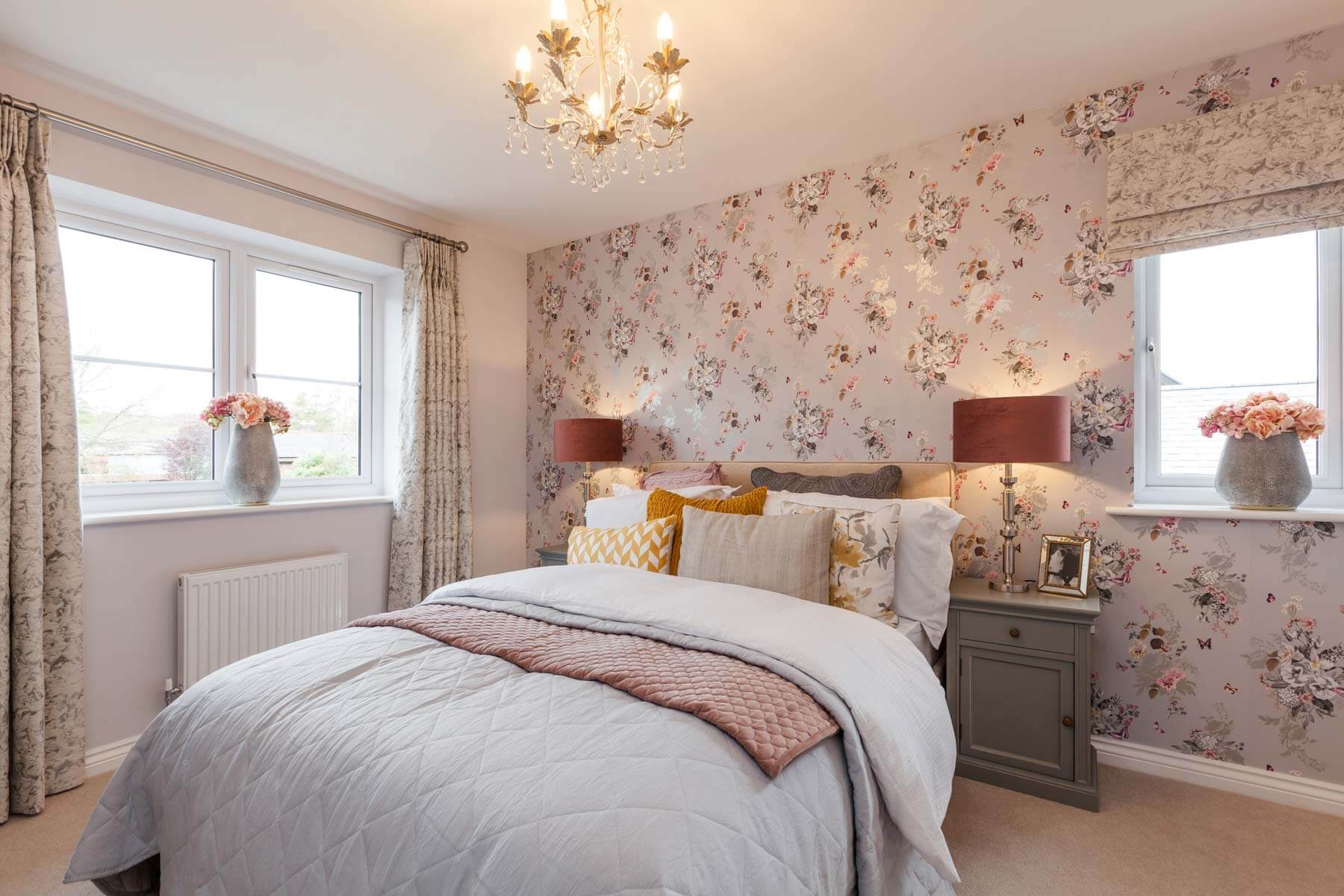 The cosy main bedroom with space for storage