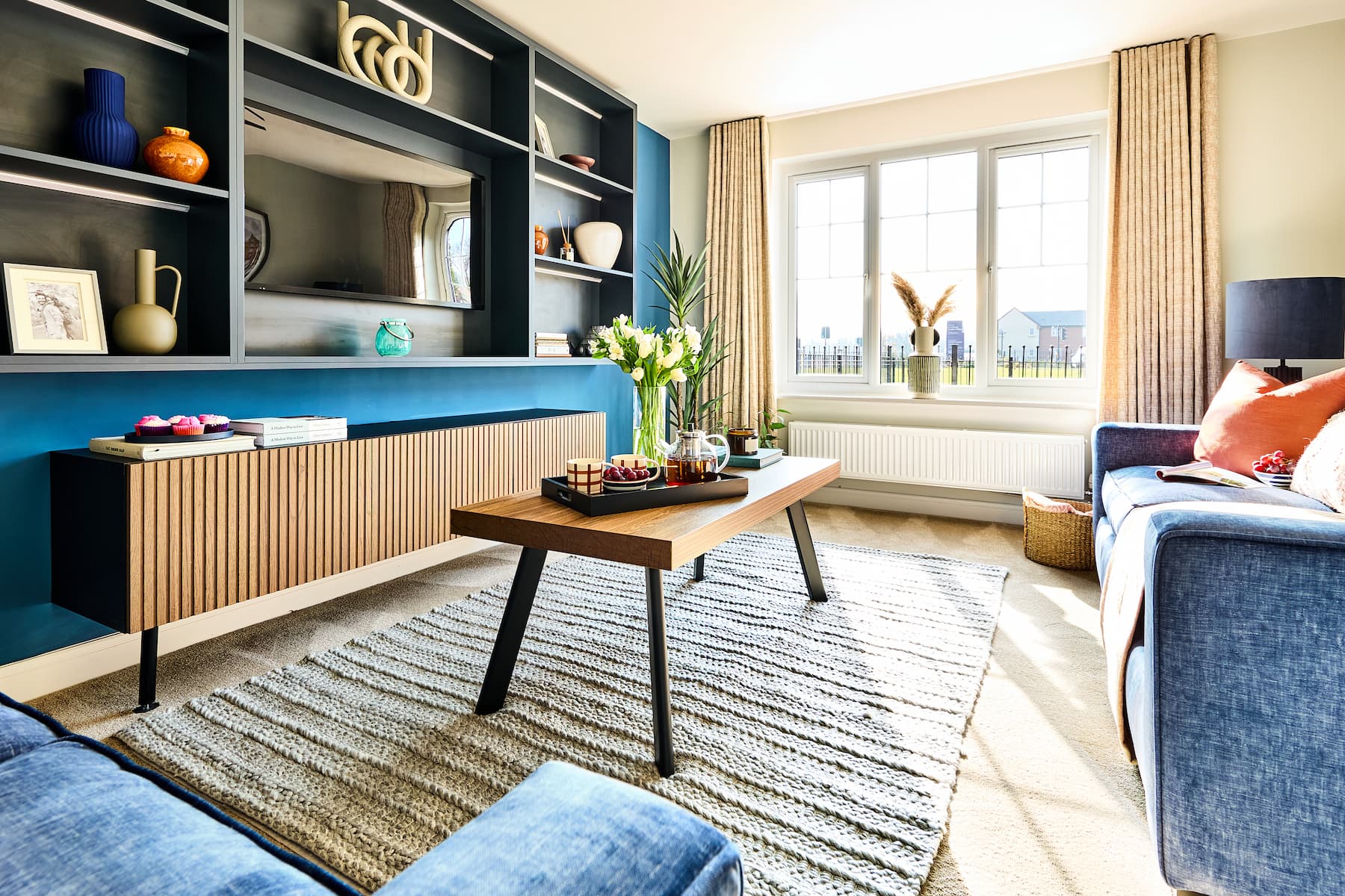 Large windows flood the living room with light