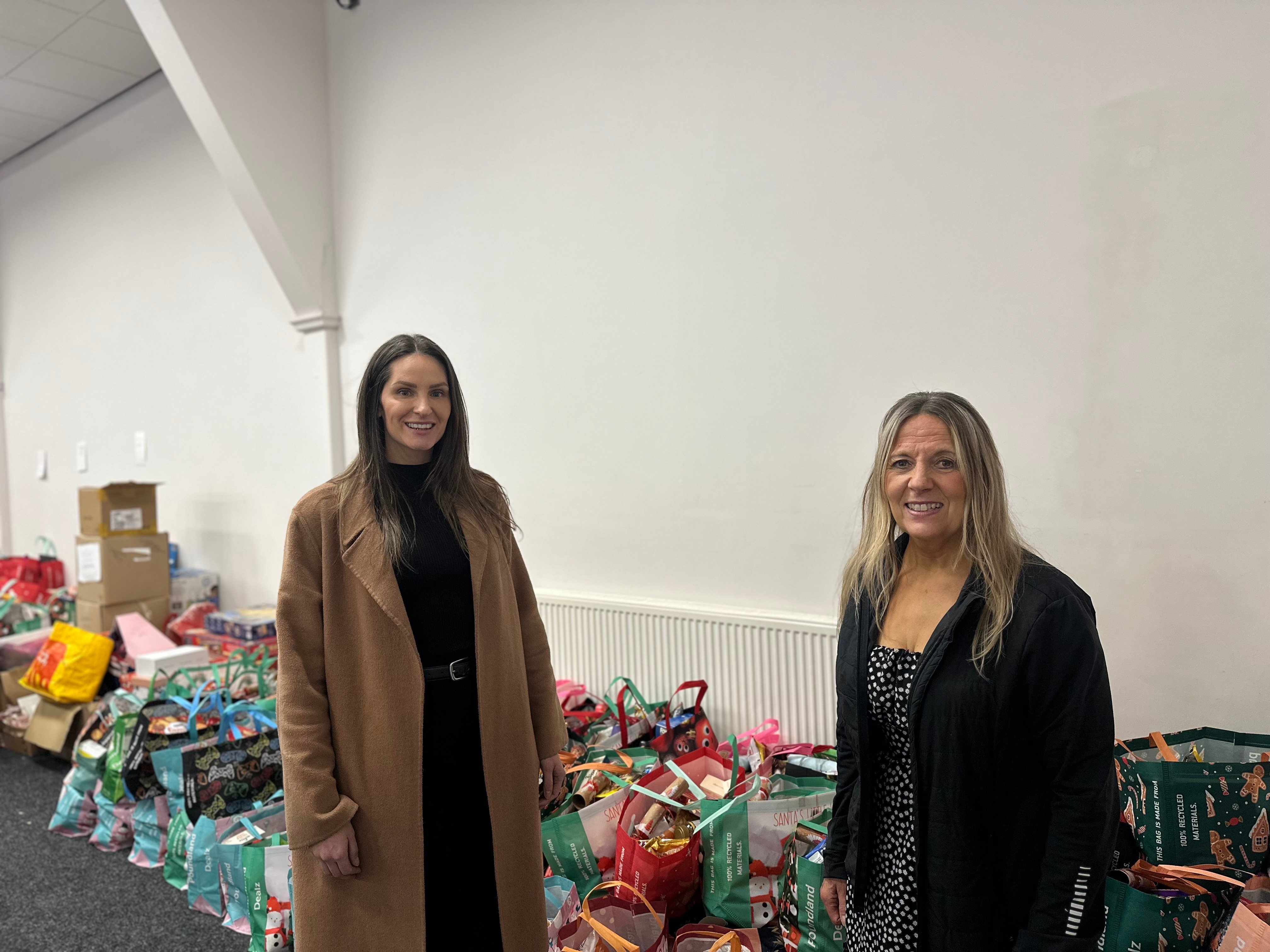 Nicki Hope, Sales and Marketing Director for Taylor Wimpey North Yorkshire alongside Darlington Cares team member, Caroline 