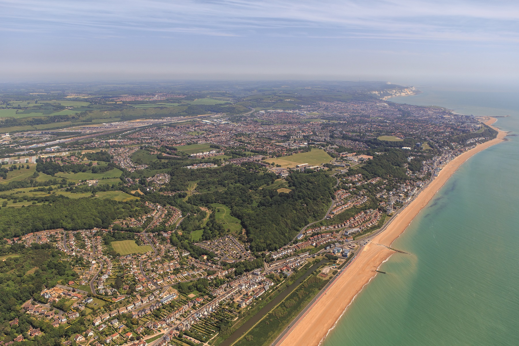 The development features paths to the coast, which is less than a mile away