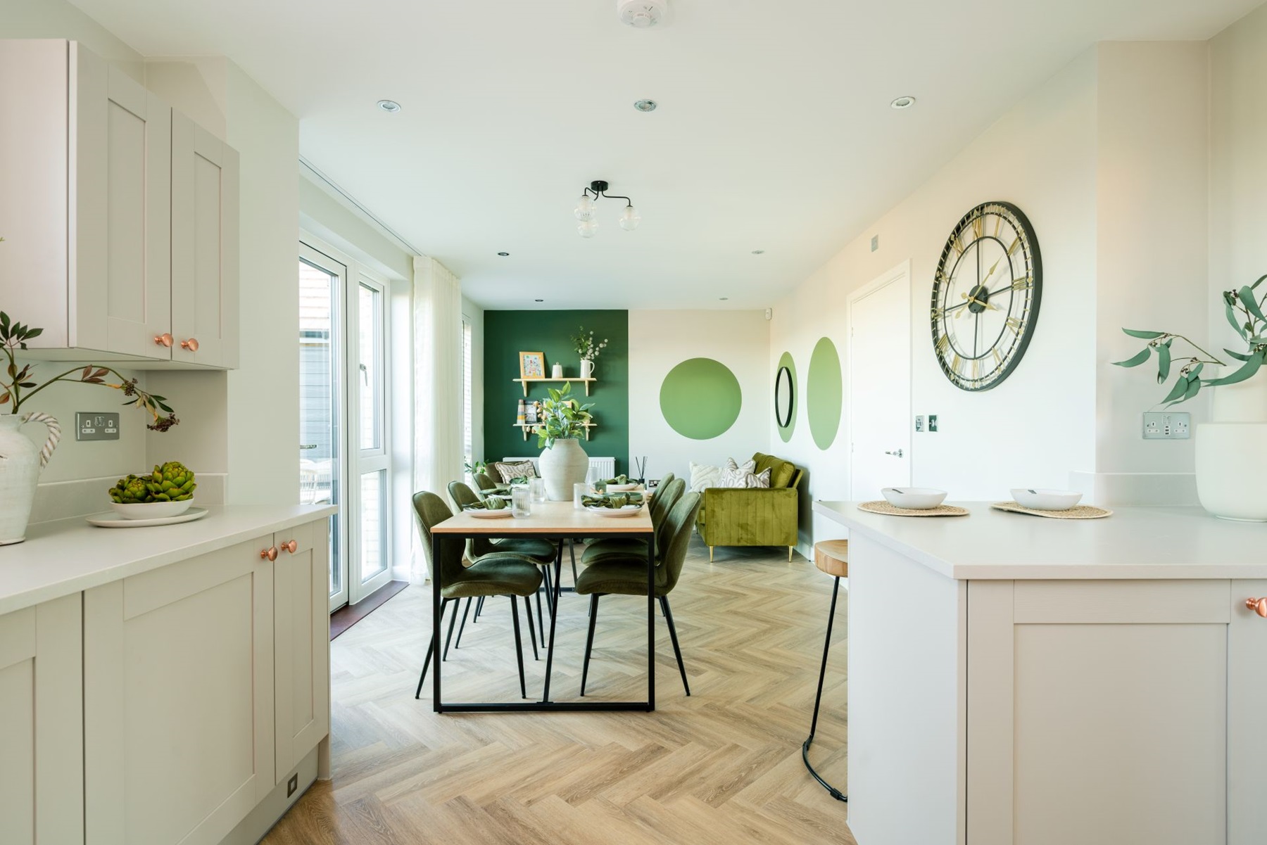 The kitchen area flows seamlessly into the dining and family area