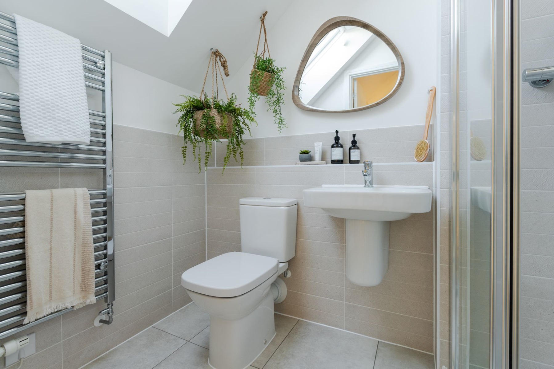 The second floor of this home benefits from a light and airy shower room