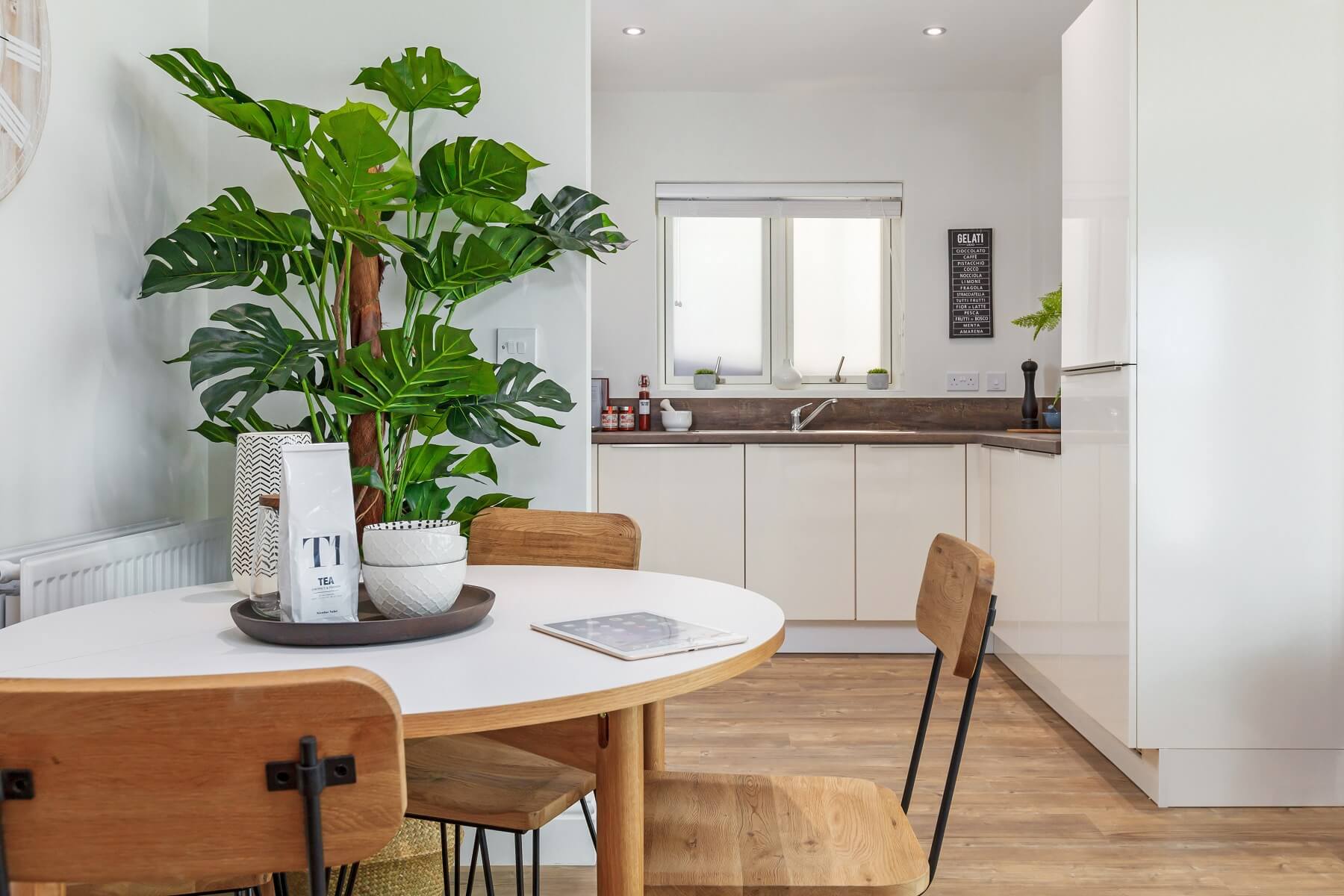 The kitchen area is separated from the rest of the living area