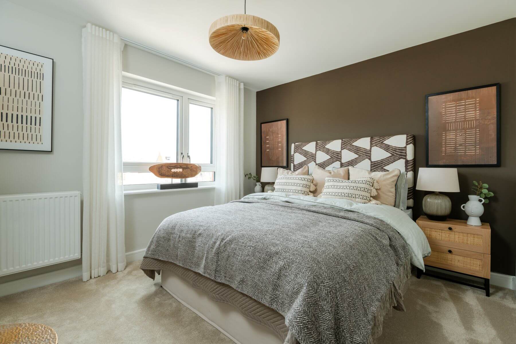 The main bedroom features a luxury en suite shower room