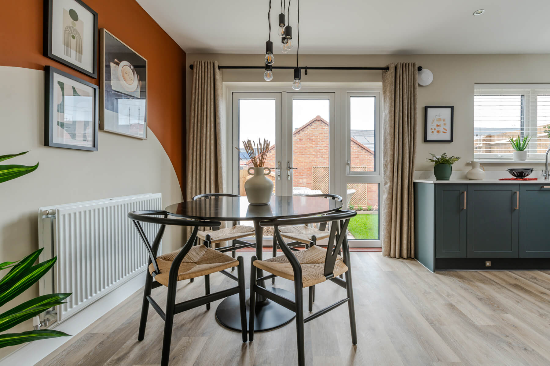 The double doors in the kitchen/dining area create a light and airy space