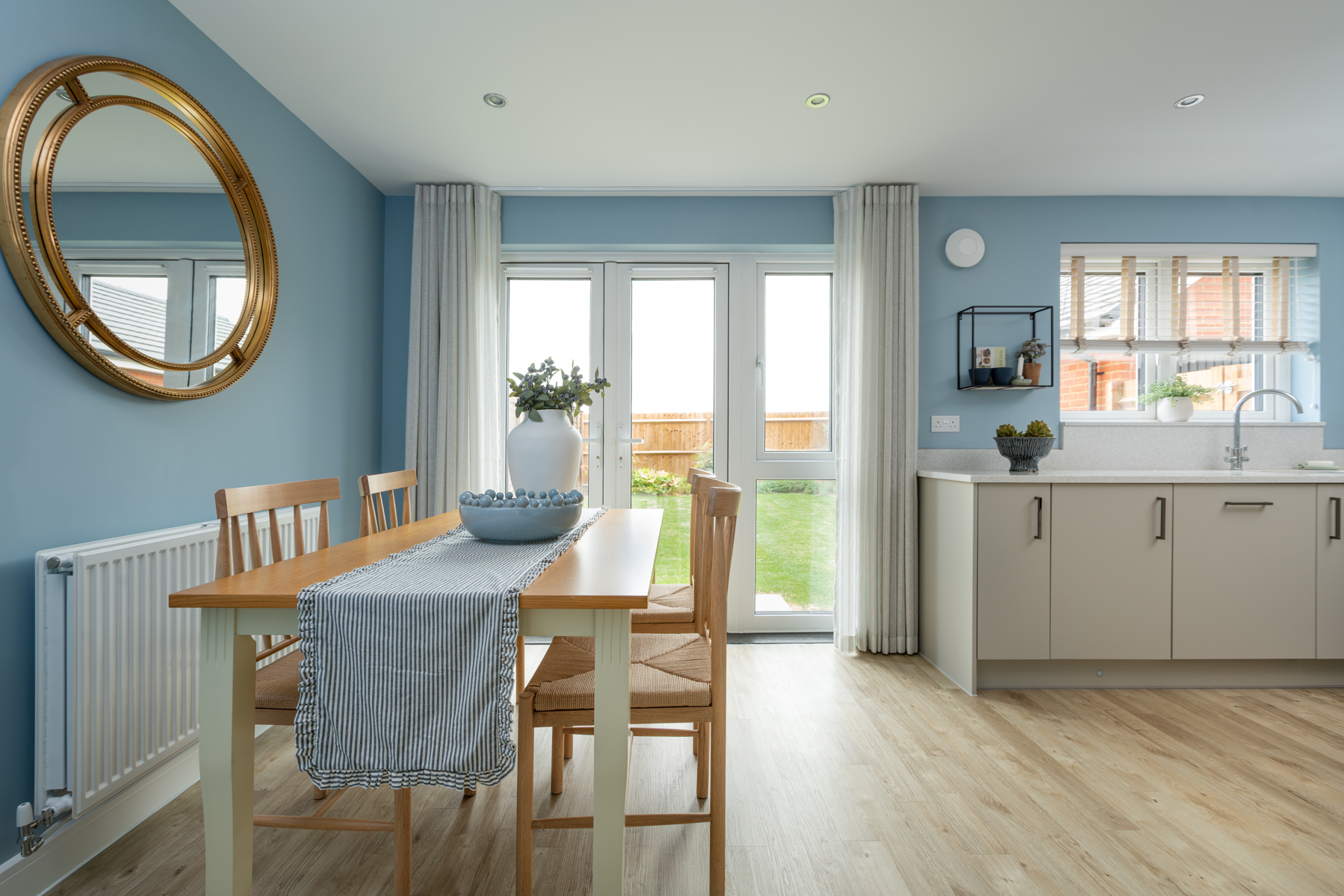The dining space boasts plenty of natural light