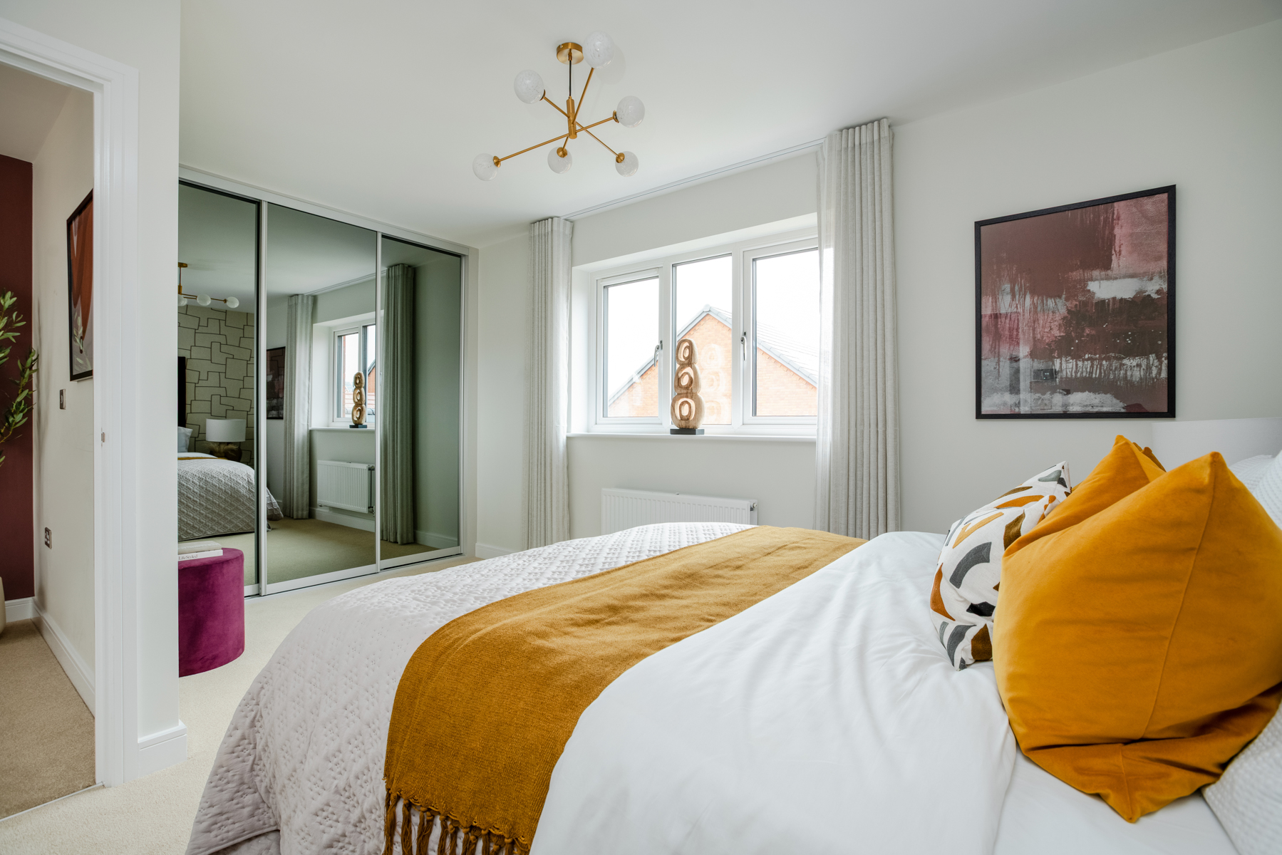 A stunning main bedroom with room for fitted wardrobes