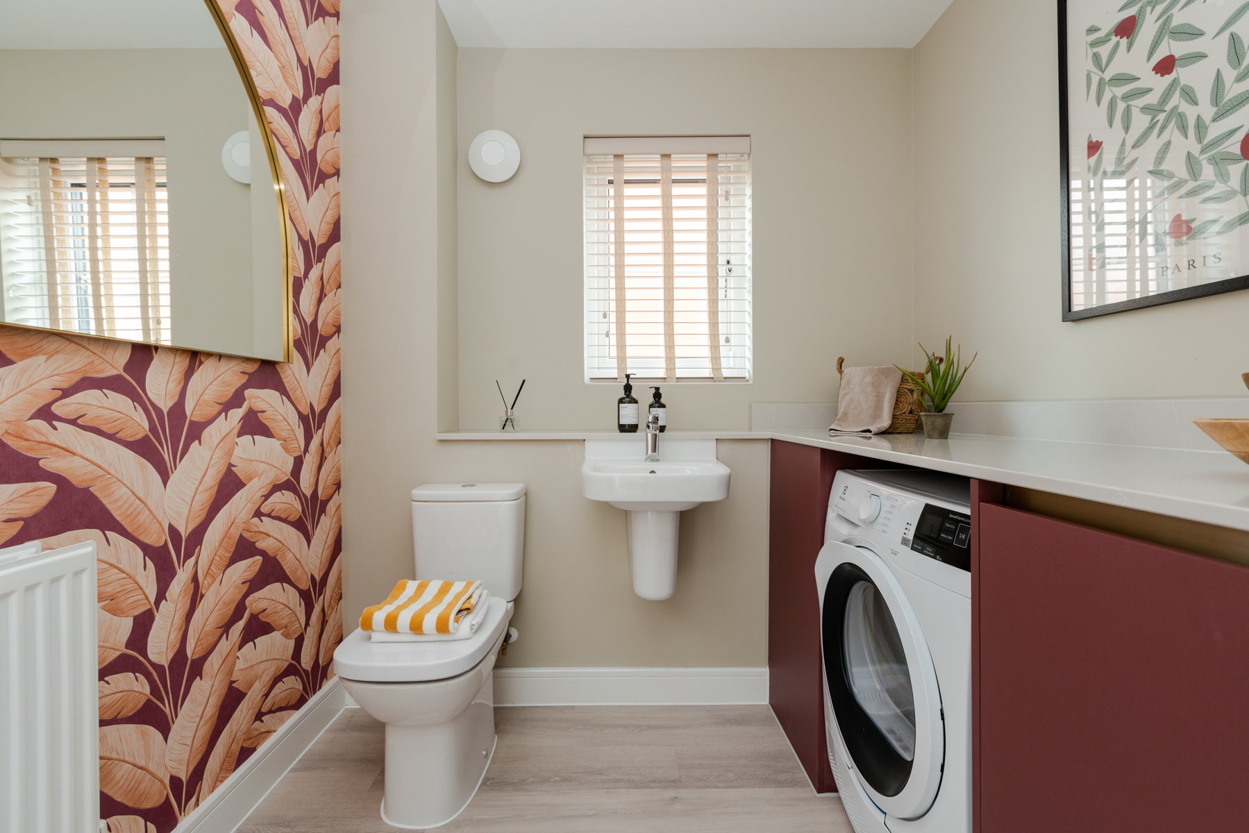 Your laundry appliances can be kept separate in the convenient cloakroom/utility