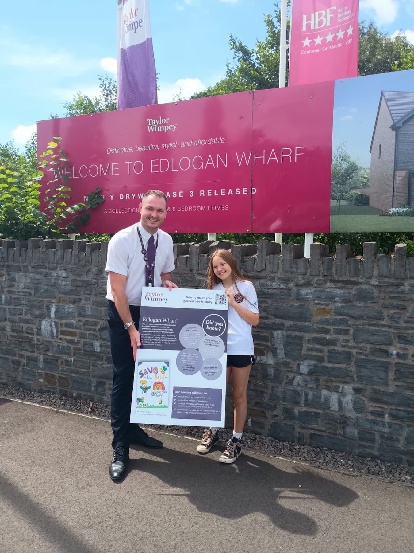 Our Lady of the Angels RC Primary School pupil, Rio, with her winning sign at Edlogan Wharf