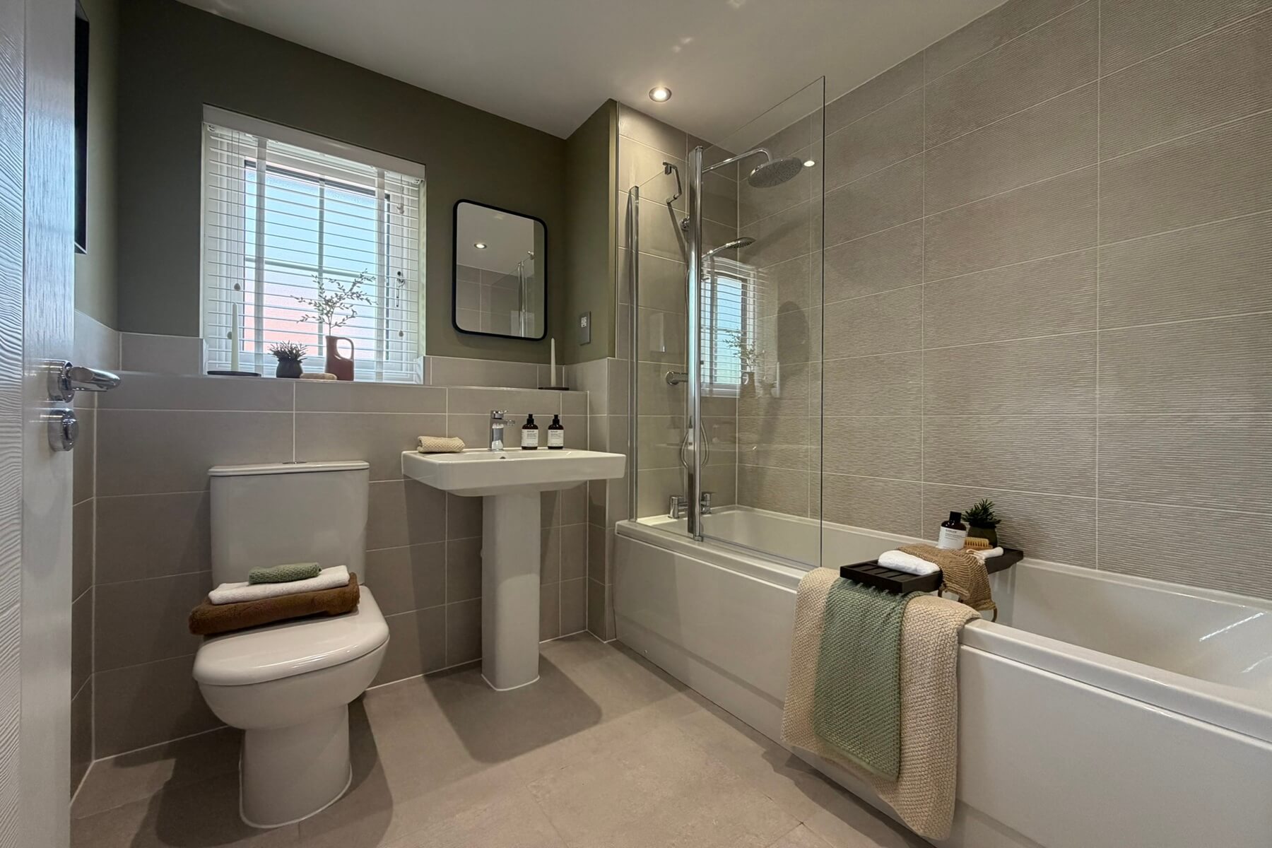 Family bathroom with bath and modern fittings