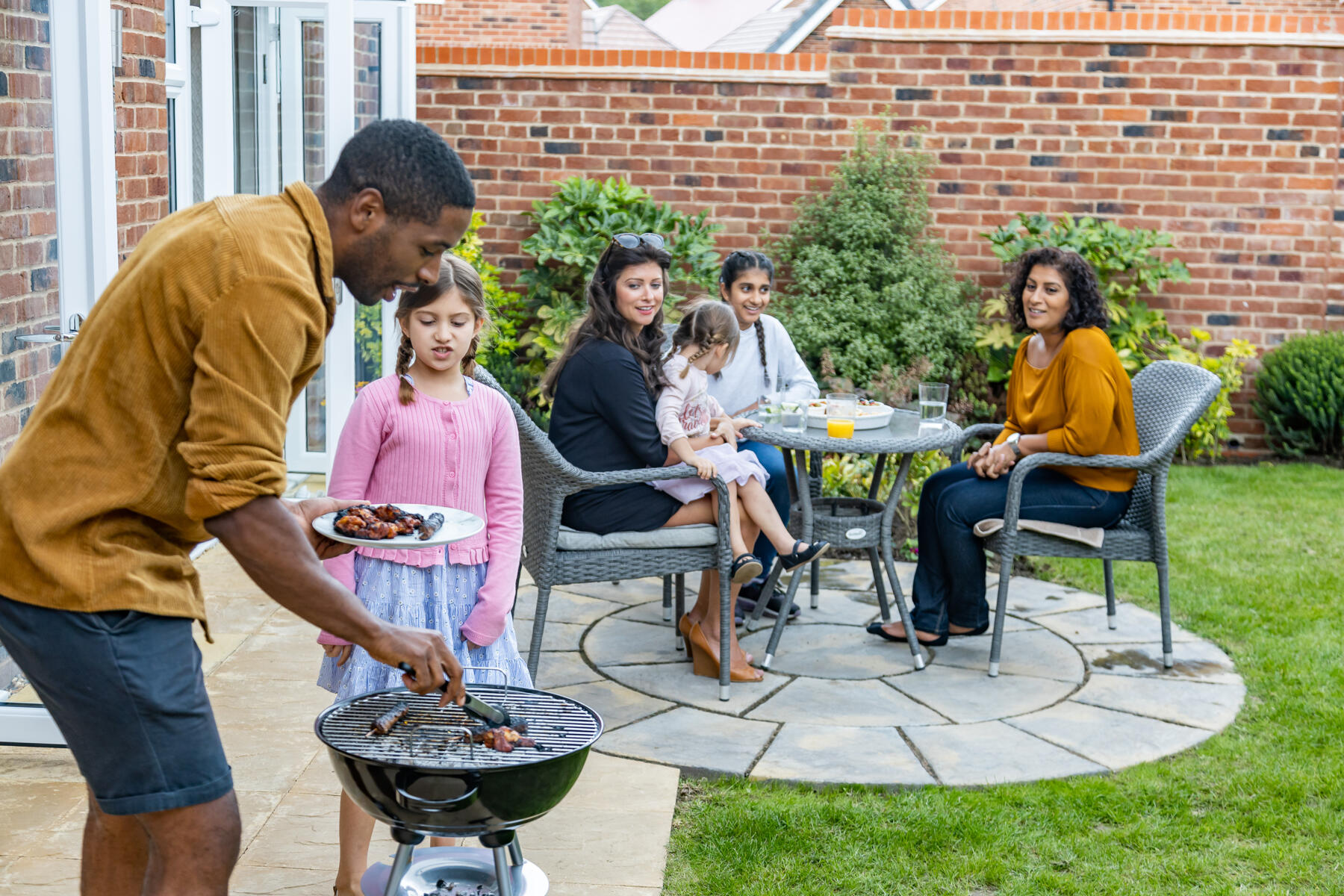 Family socialising in the garden