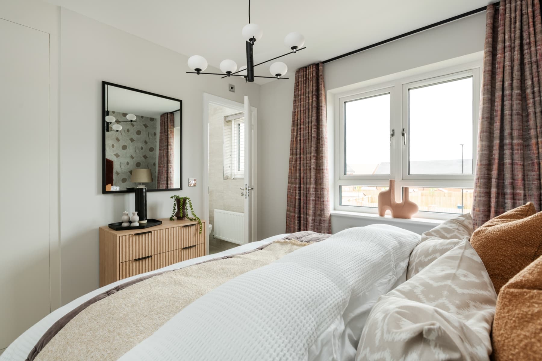 The main bedroom is complete with a private ensuite