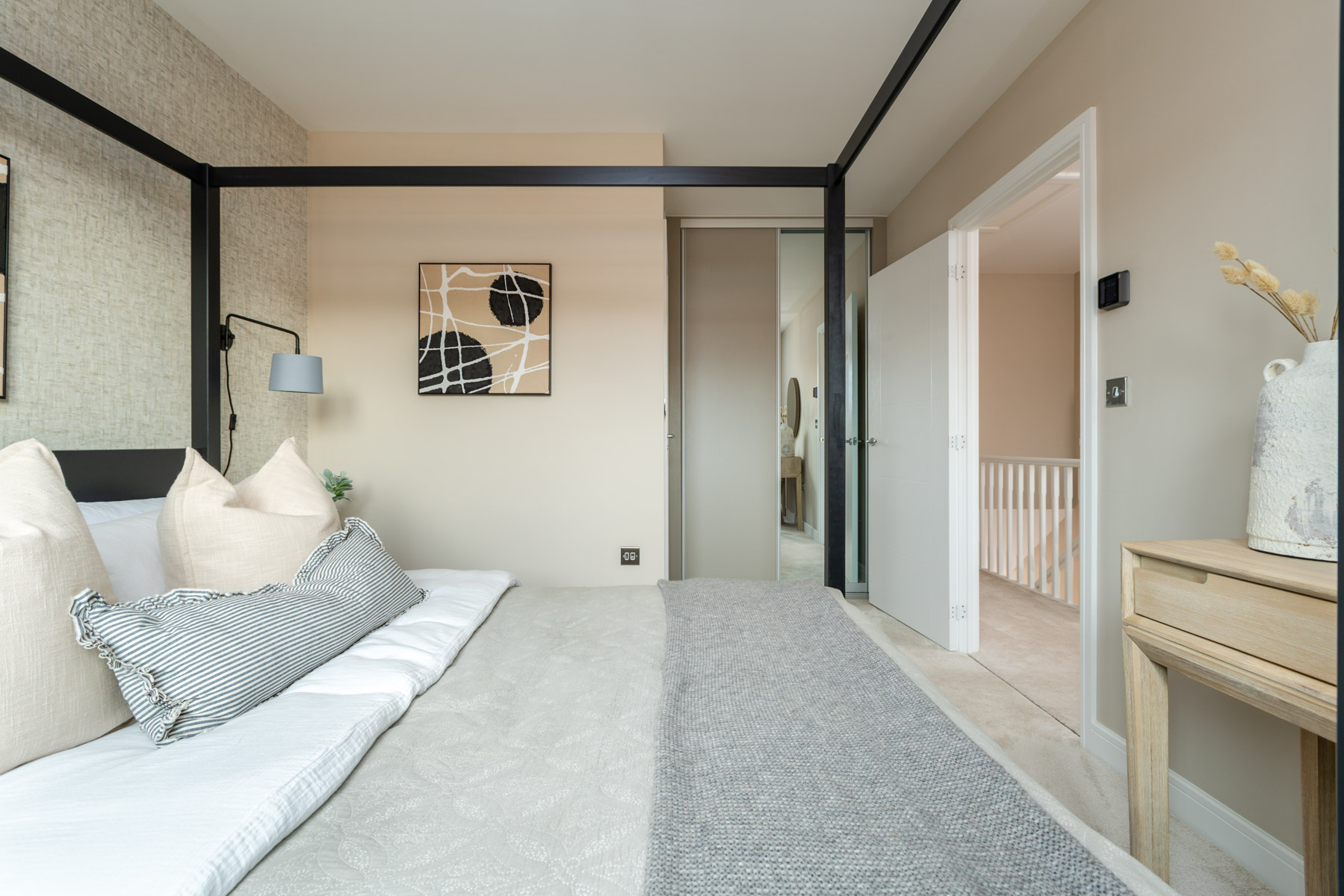 Spacious principal bedroom with room to relax