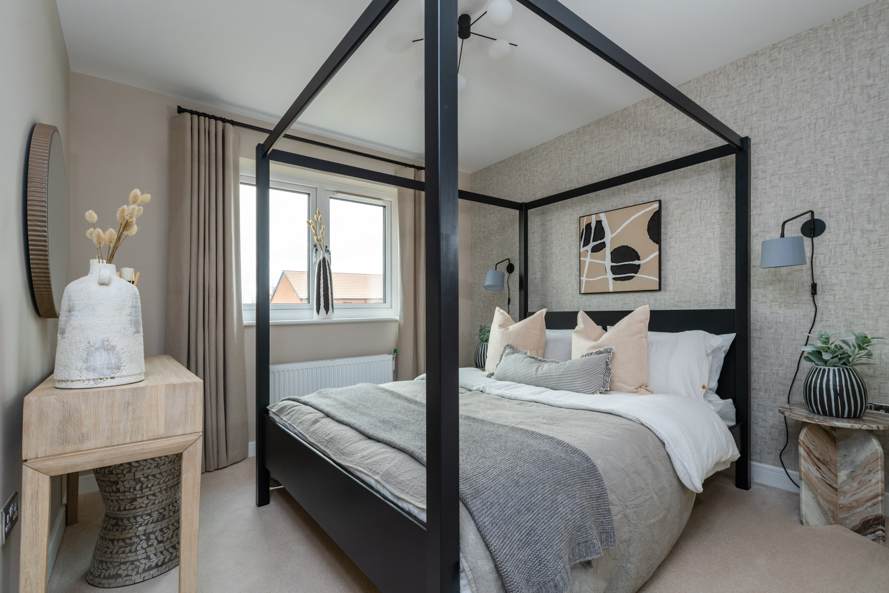Well-proportioned principal bedroom designed for comfort