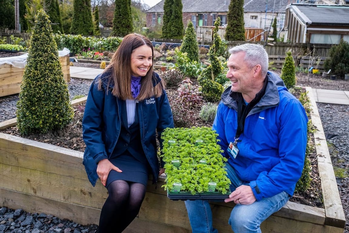 Glenboig Development Trust Community Garden holding plants