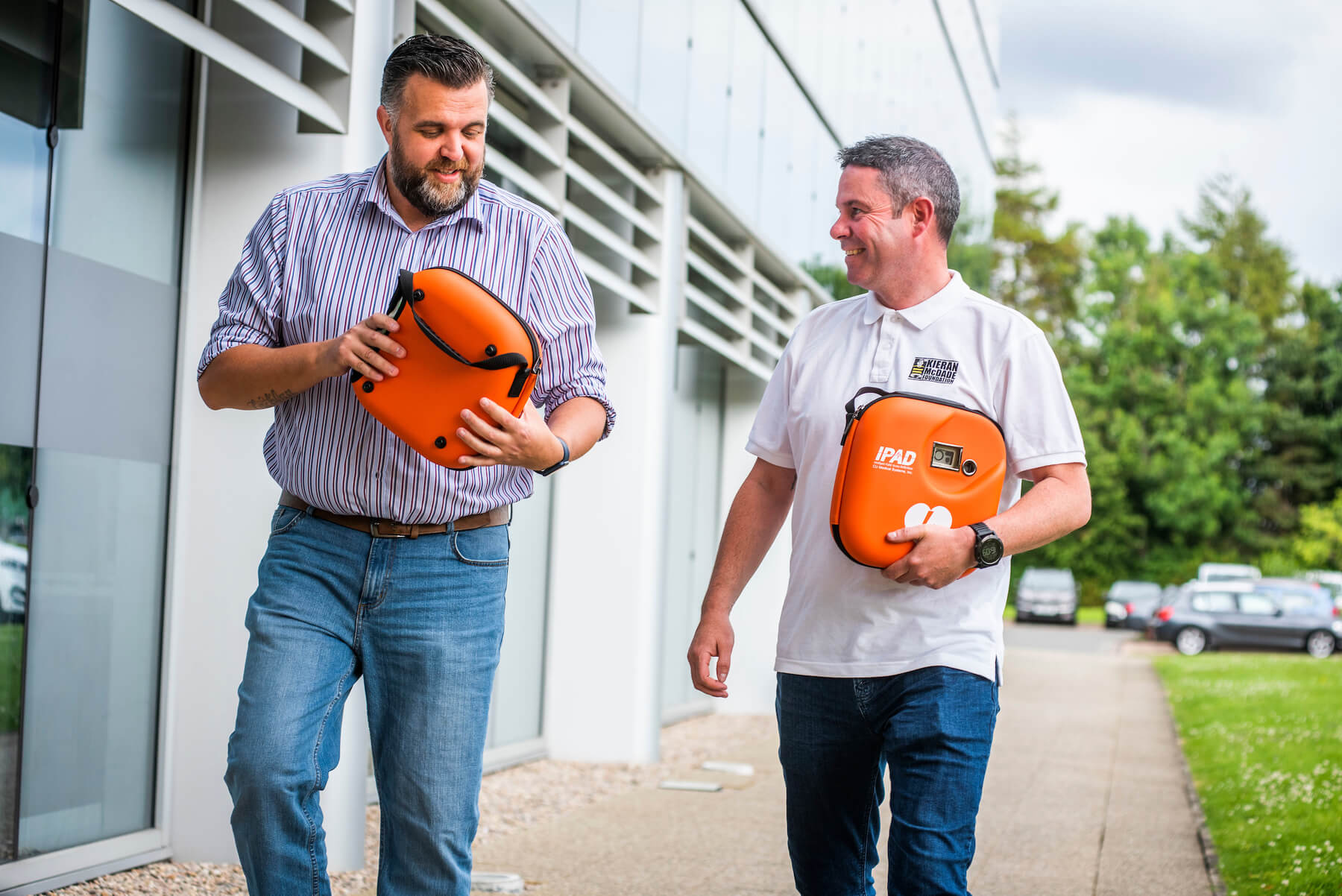 two lifesaving defibrillators to the Kieran McDade Foundation North Lanarkshire Taylor Wimpey