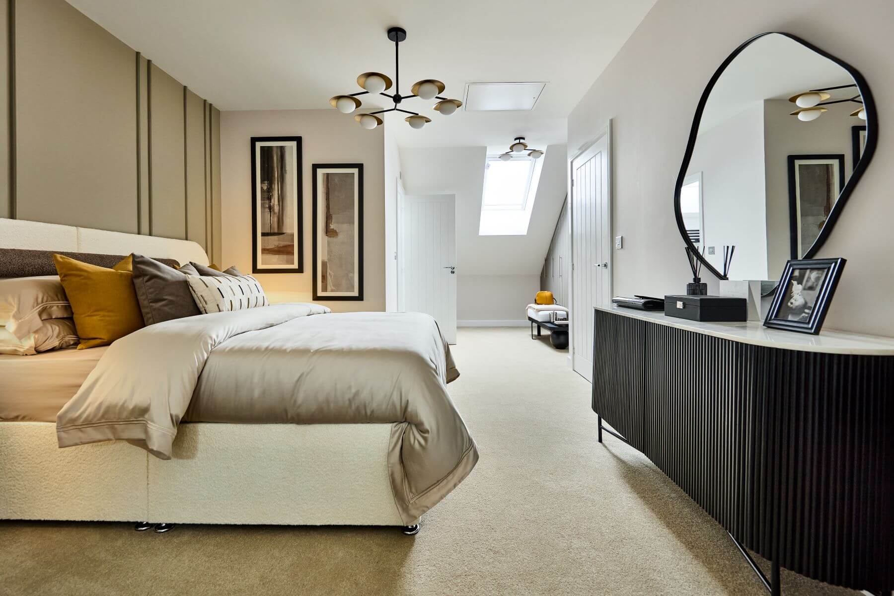 The show stopping main bedroom features a dressing area