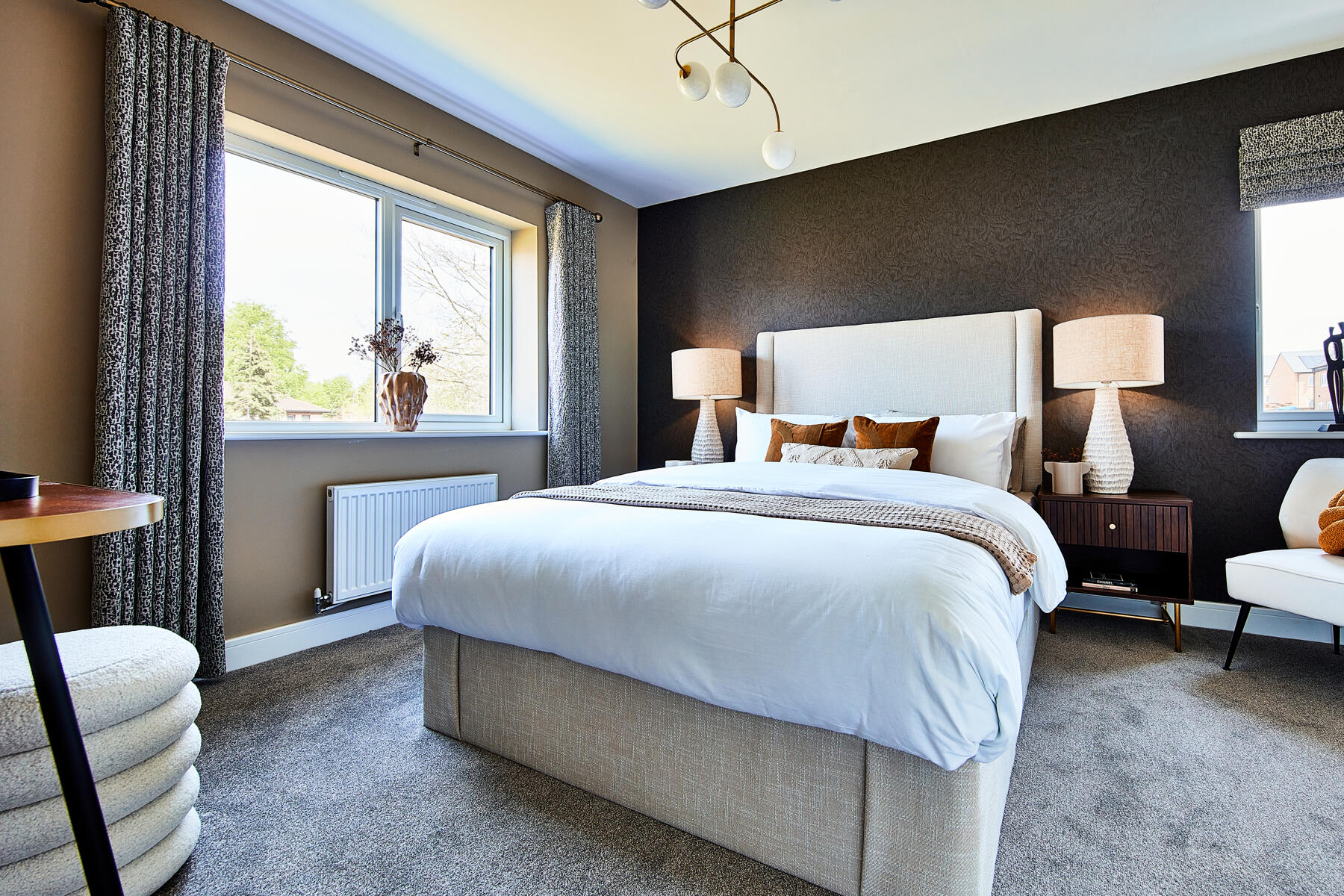The main bedroom is flooded with natural light