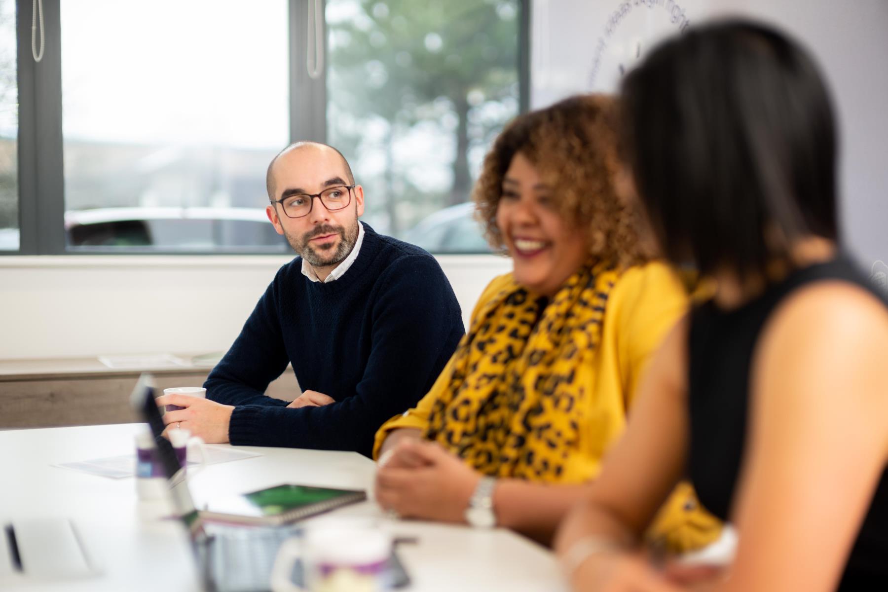 Employees having a meeting