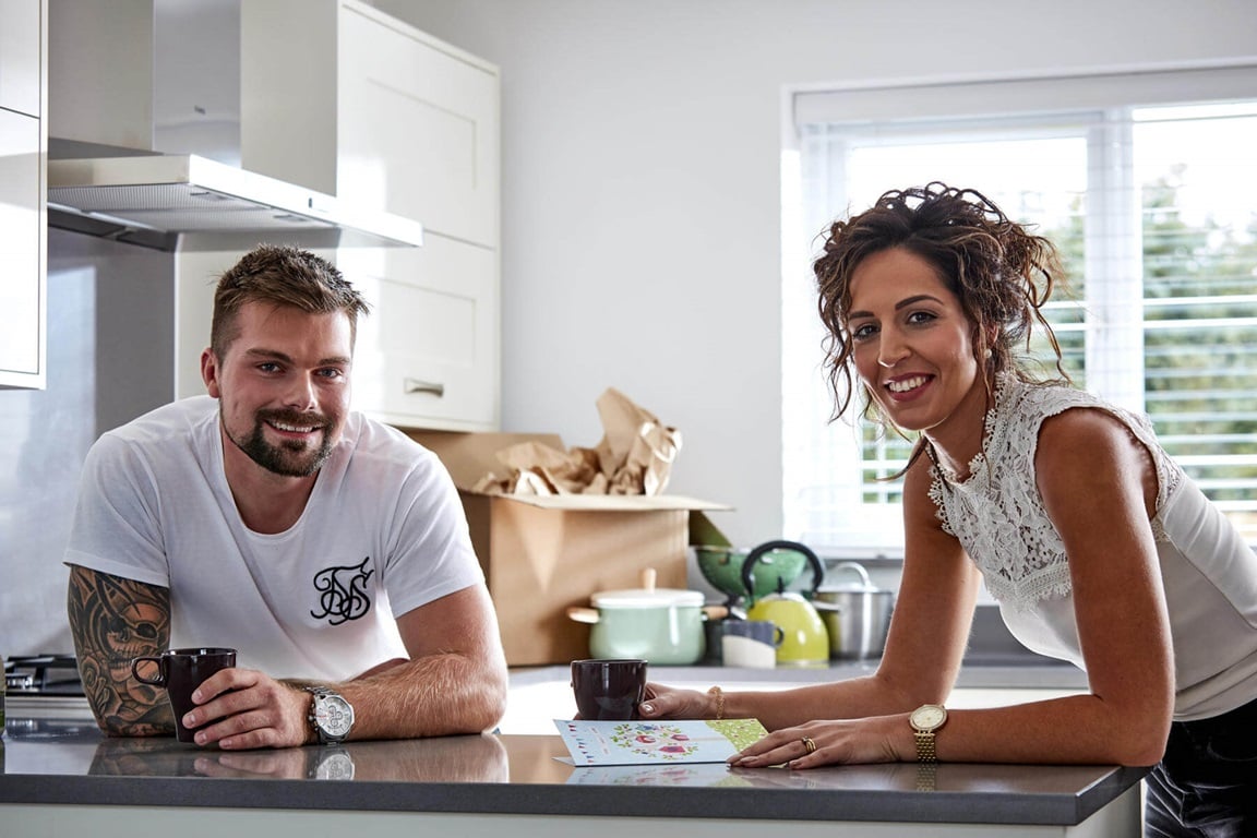 Young couple in their new kitchen
