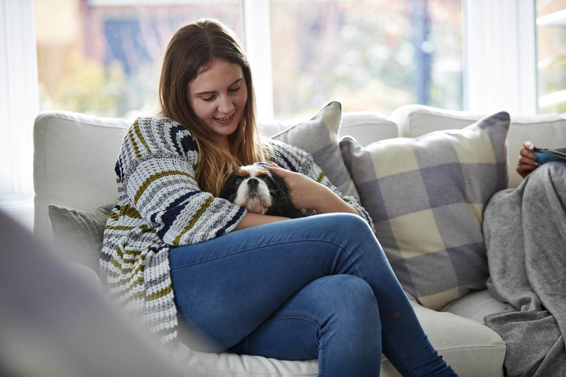 Customer and her dog enjoy their new home