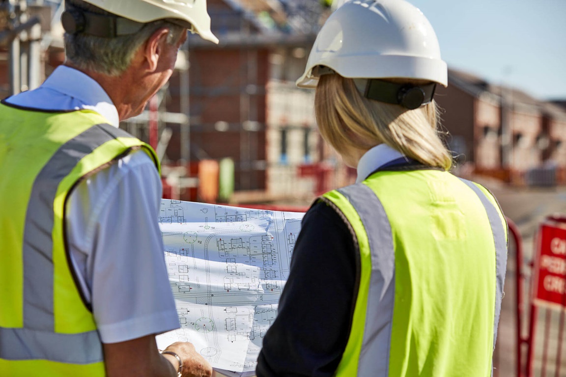 Site Managers looking at development plans