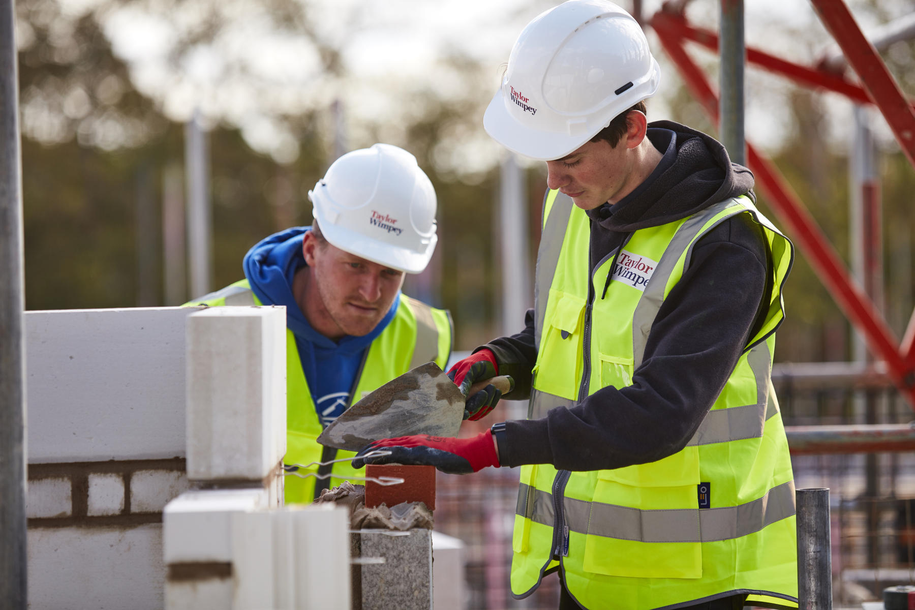 Two men bricklaying