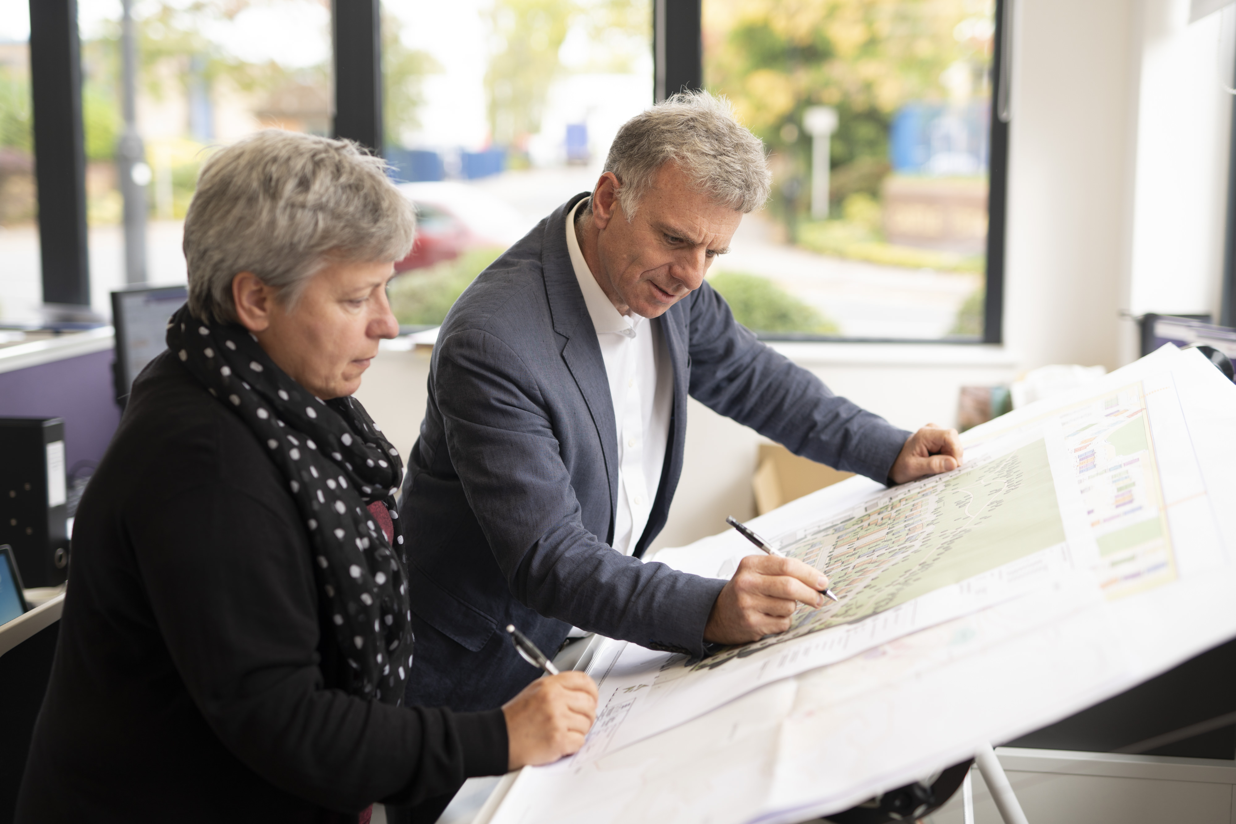 People looking at plan