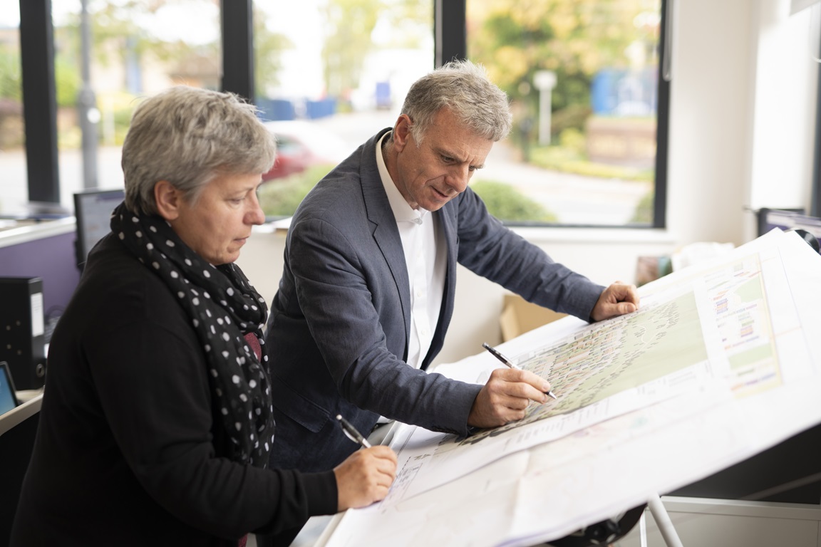 People looking at plan