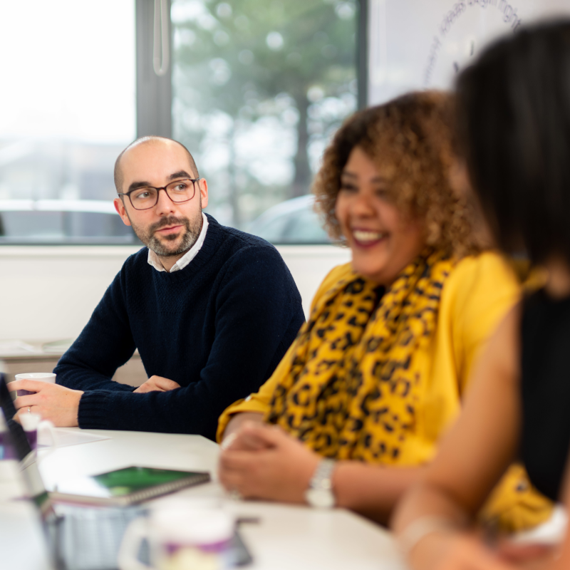 Employees having a meeting