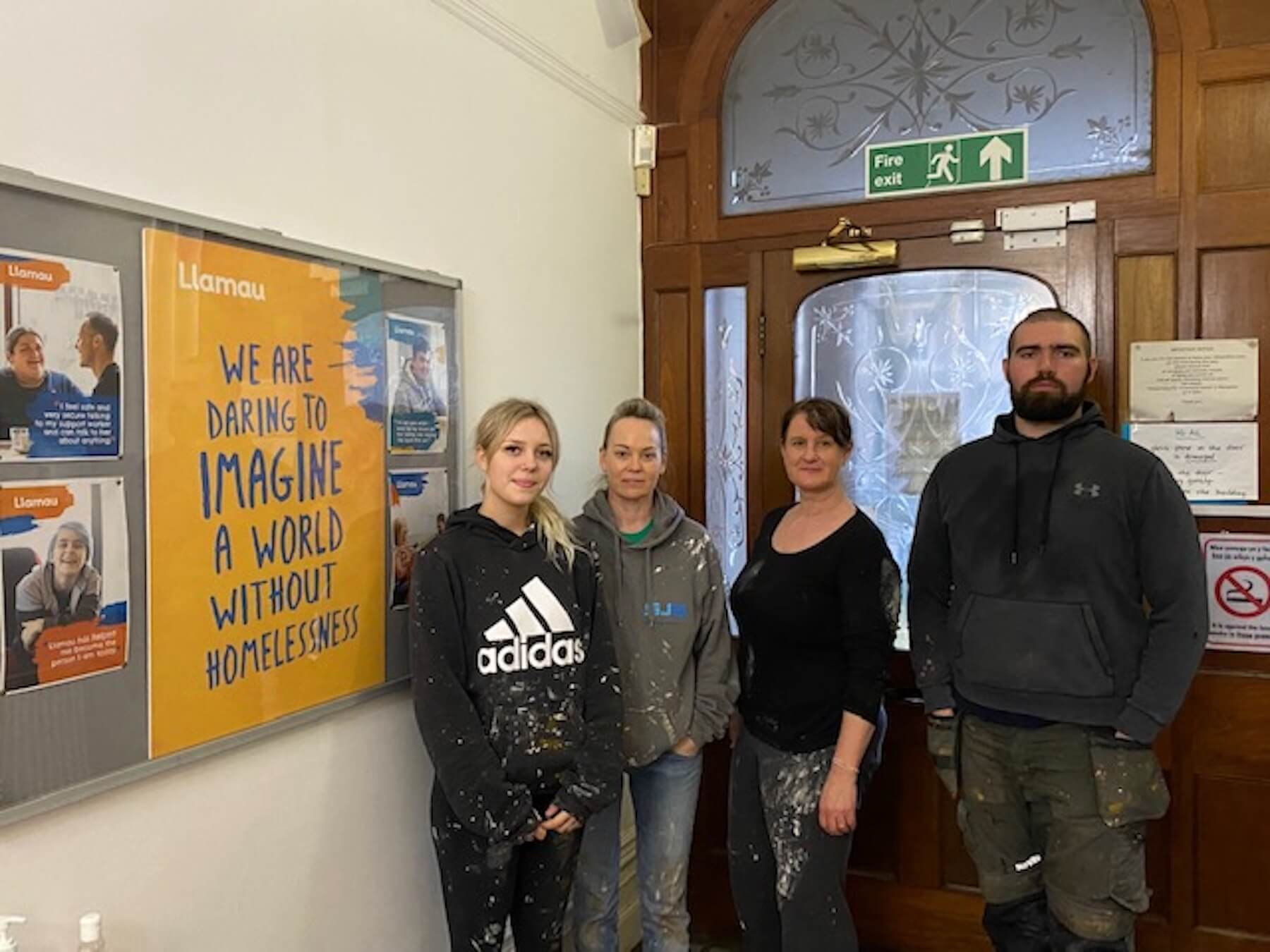 Taylor Wimpey team repaint Llamau Cardiff office
