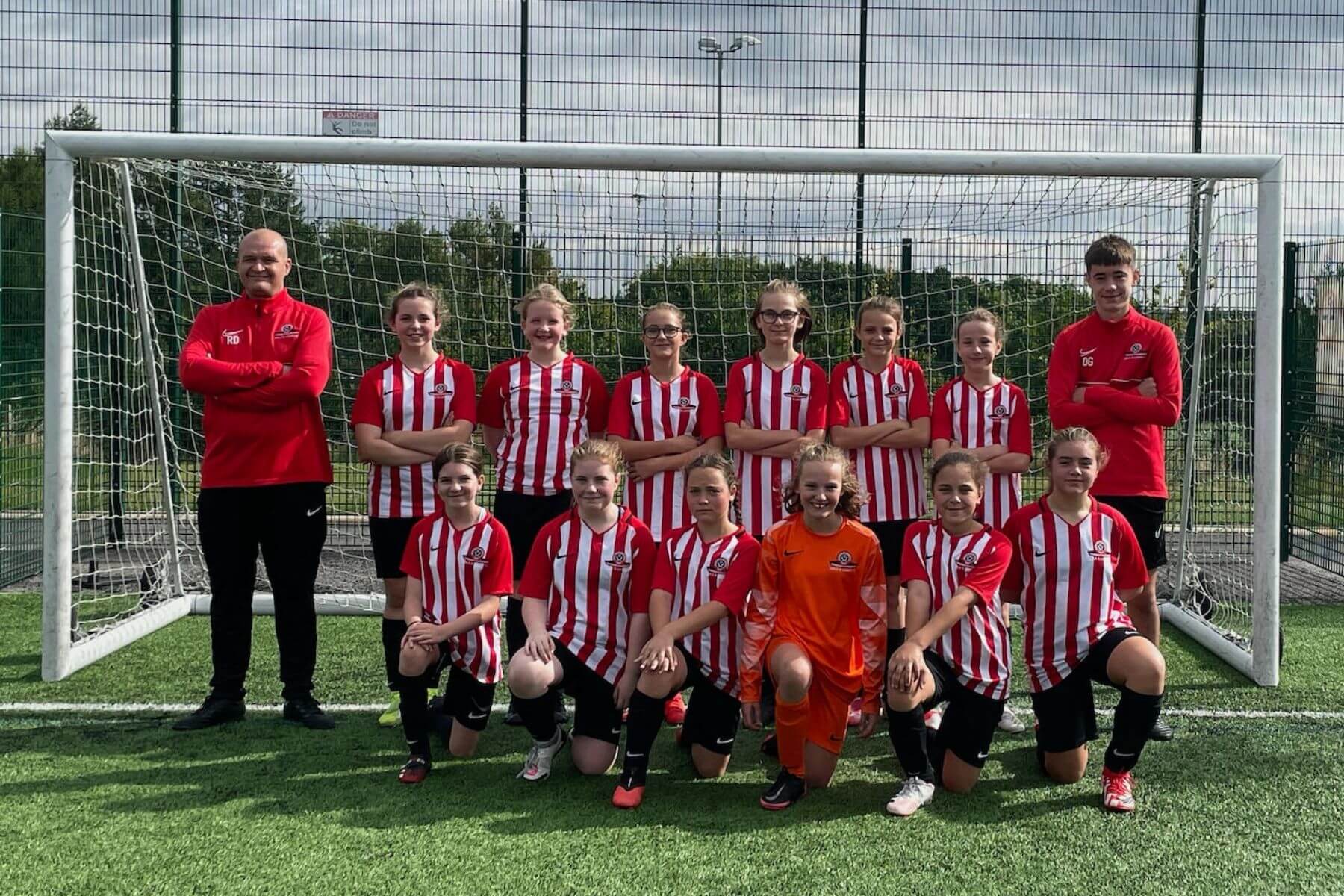 Youth football team in red kit