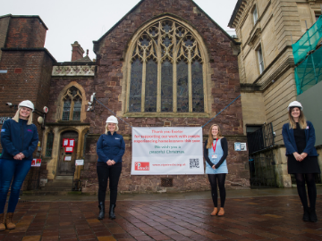 Workers stood outside community church