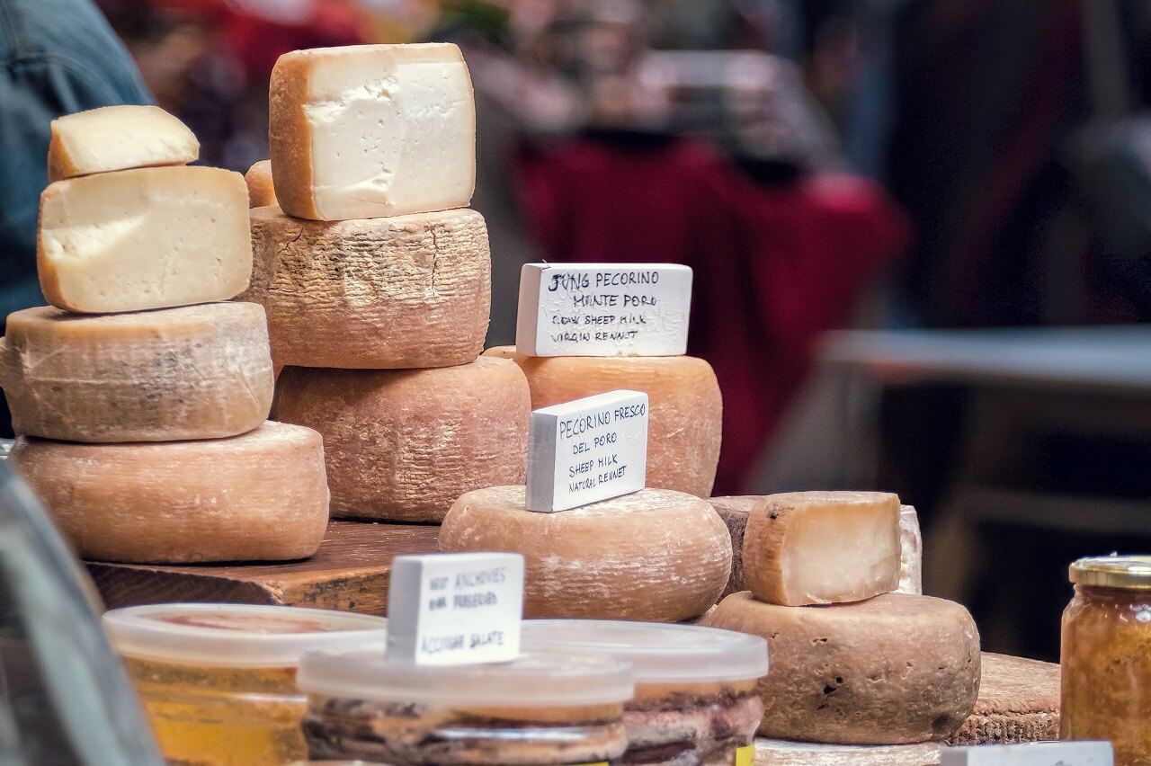 Cheese on display at a market