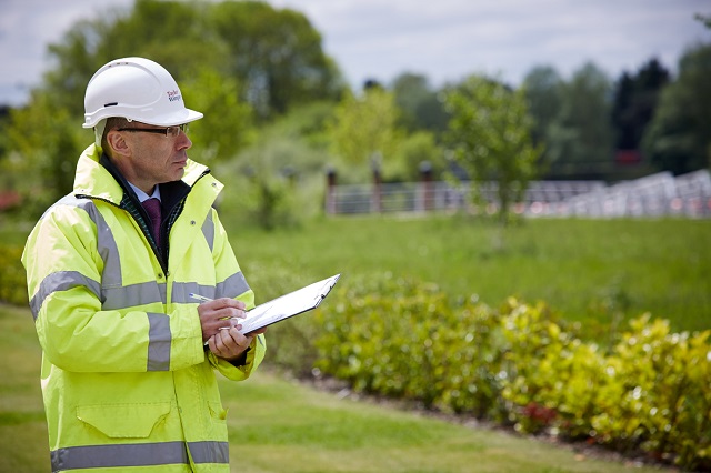 Man in hi vis outside