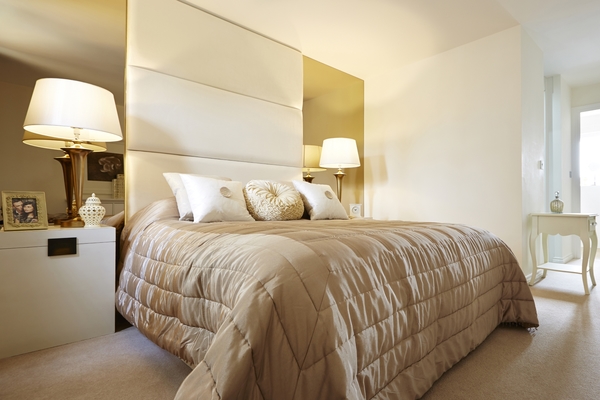 Bed with upholstered panels