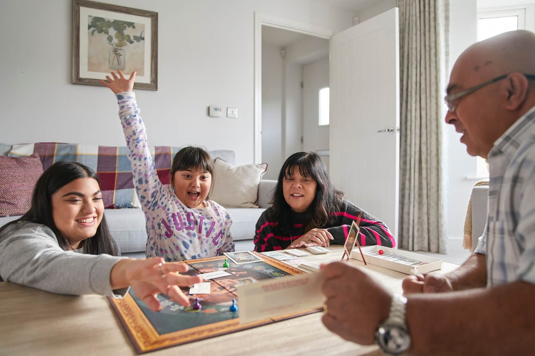Family playing a board game