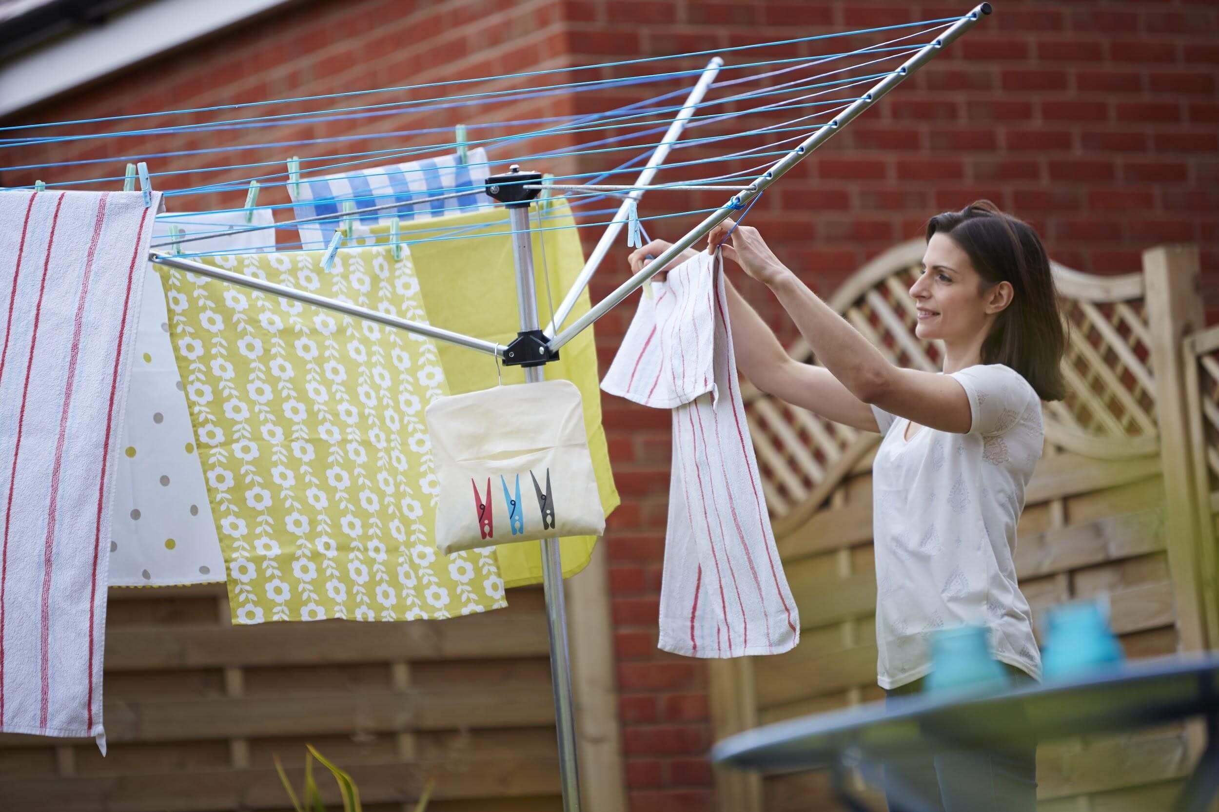 Customer hanging laundry