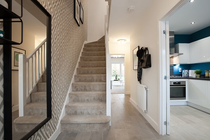 Grey hallway looking into kitchen