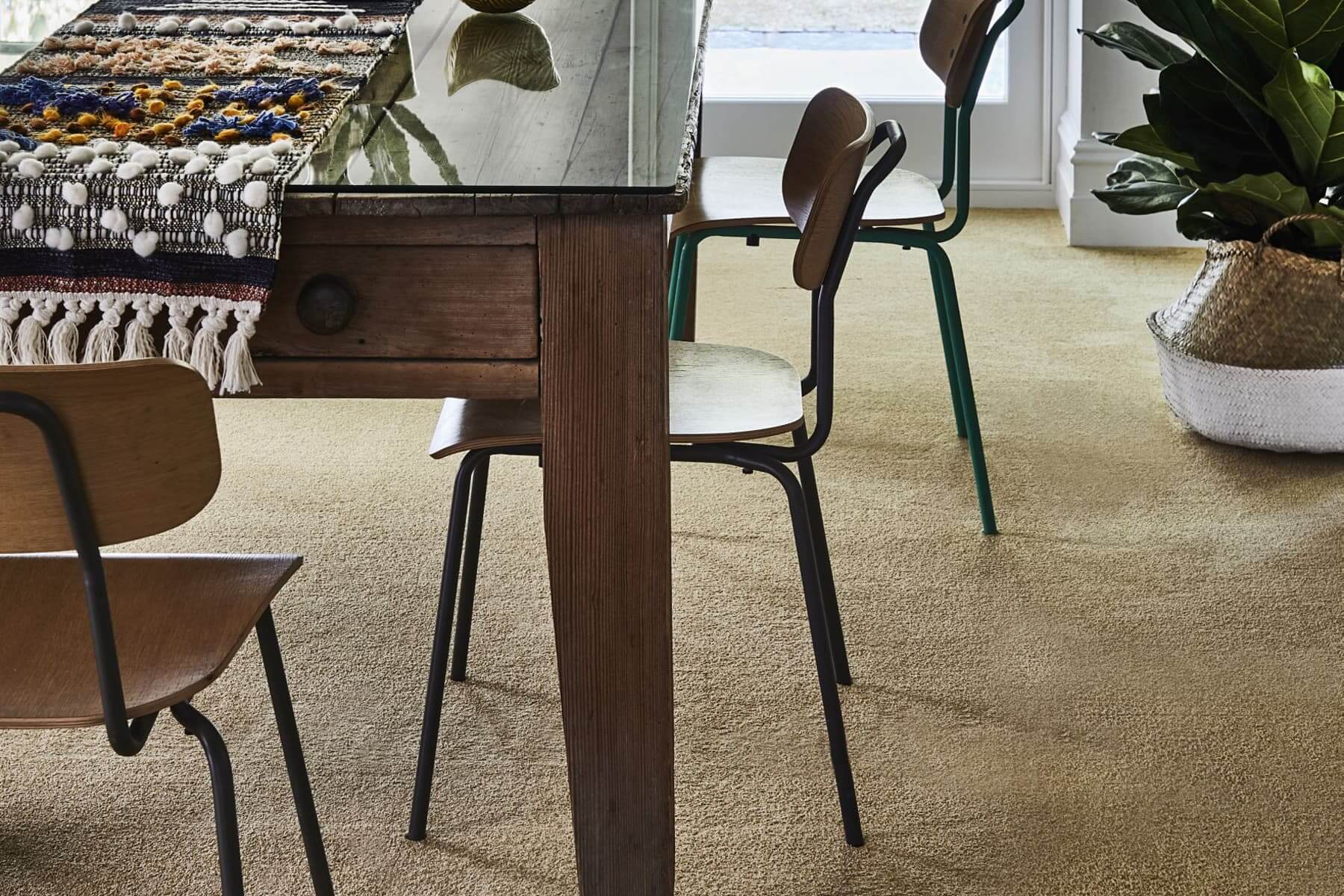 Carpeted floor in dining area