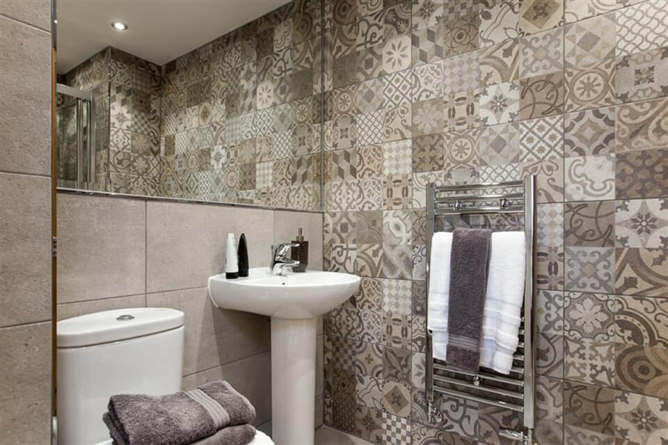 Bathroom with patterned tiles
