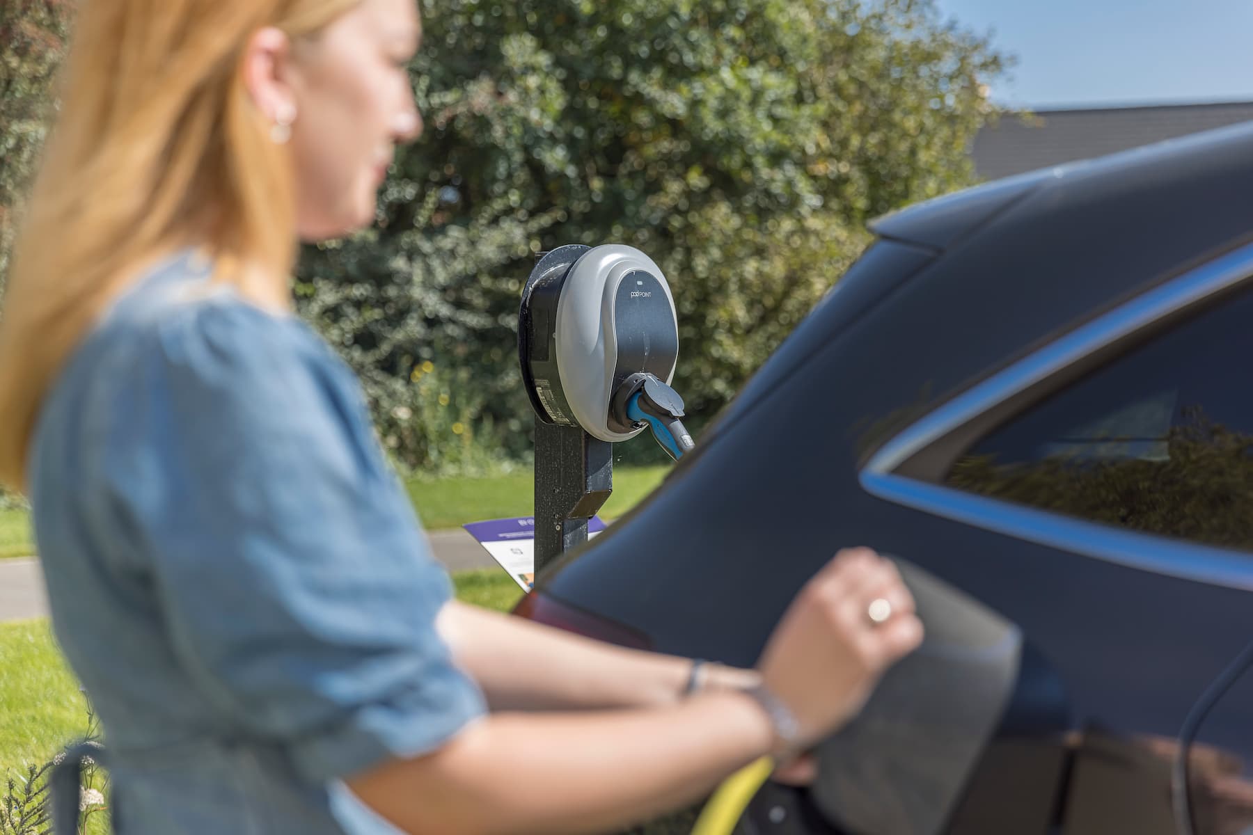 Customer using EV charger